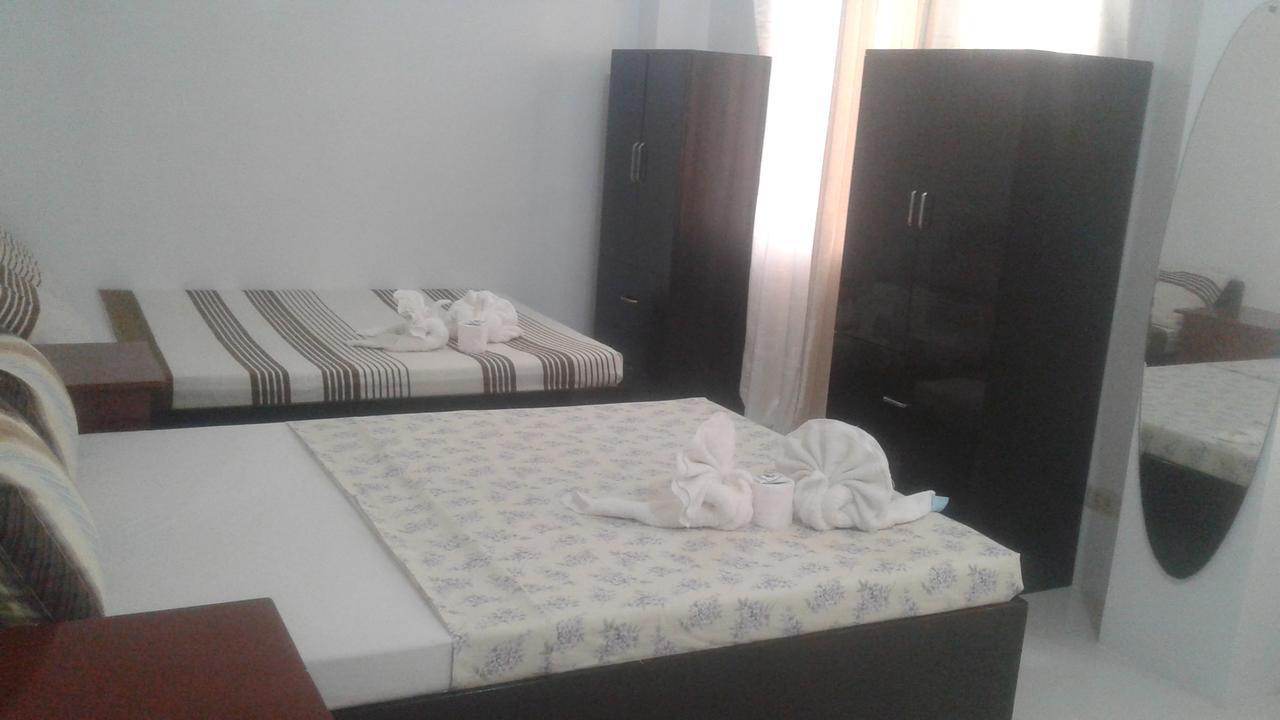 Chelle'S Apartelle - Inn Эль-Нидо Экстерьер фото